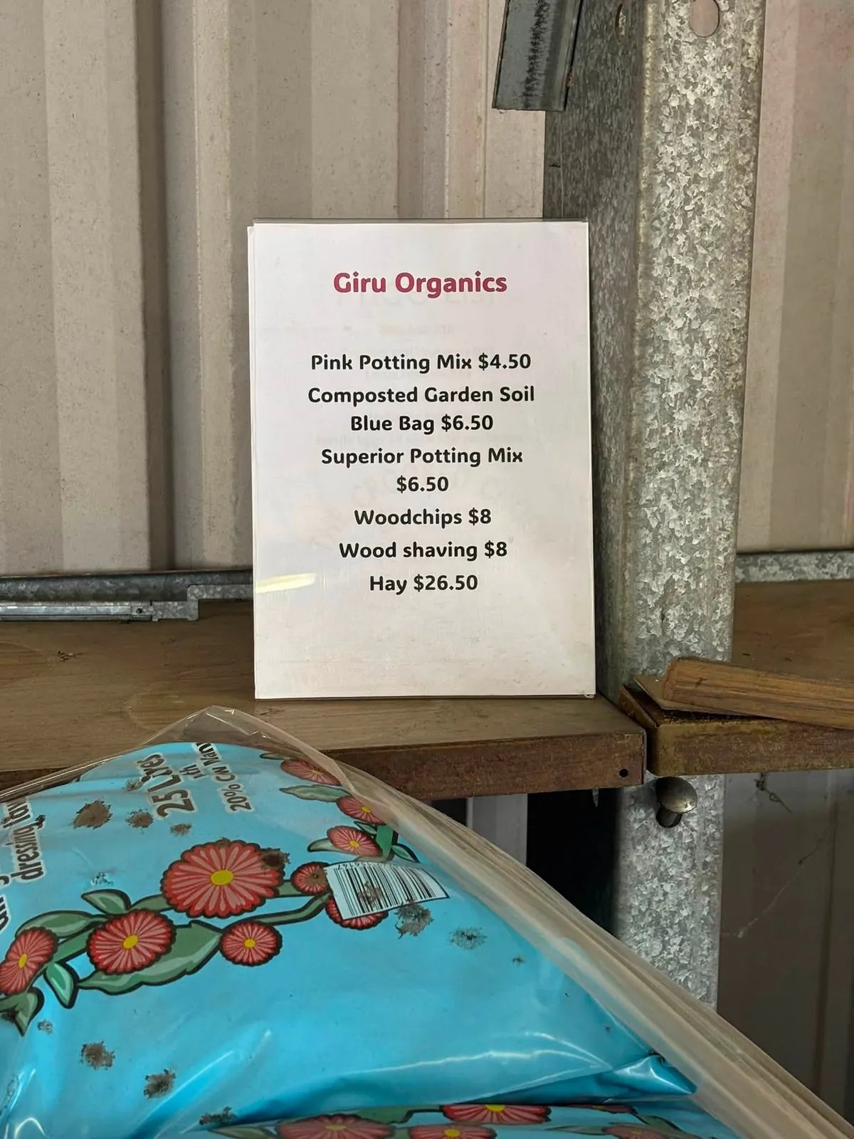 Giru Organics potting mix information board at Giru Feed & Farm Supplies